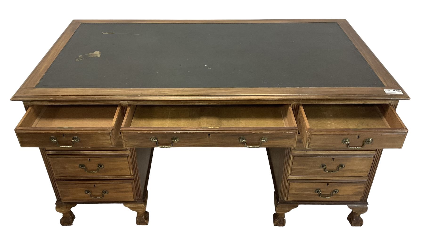 Georgian design twin pedestal desk, rectangular top with green leather inset, fitted with nine drawers, on cabriole supports with ball and claw feet 