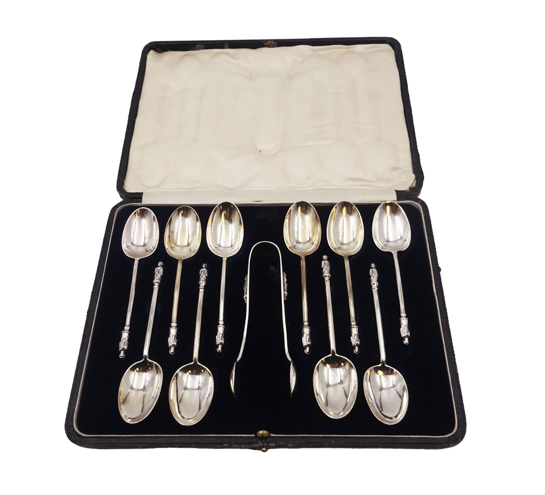 Set of ten Victorian silver Apostle tea spoons with matching pair of sugar tongs, hallmarked William Hutton & Sons, London 1889, in tooled leather silk and velvet lined case