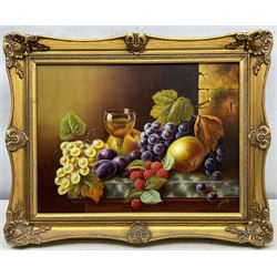 John F Smith (British 1934-): Fruit and Wine Glass, oil on board signed 29cm x 40cm 
Notes: Smith was employed by Royal Worcester as a fruit painter between 1950 and 1971.