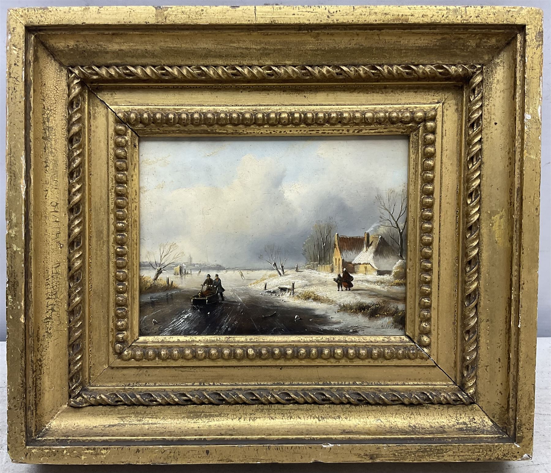 Jan Jacob Coenraad Spohler (Dutch 1837-1923): Pushing a Sled on a Frozen Lake, oil on mahogany panel signed with initials 13cm x 18cm