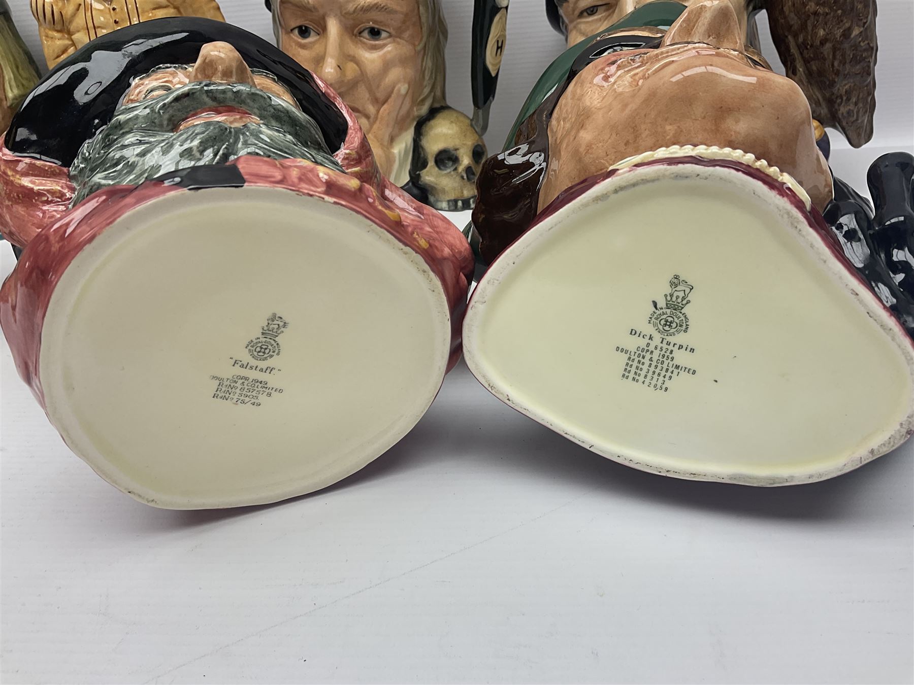 Eight Royal Doulton character jugs, including St George D6618, Guardsman D6568, The Juggler D6835 etc, together with Royal Doulton toby jug Sir Francis Drake D6660