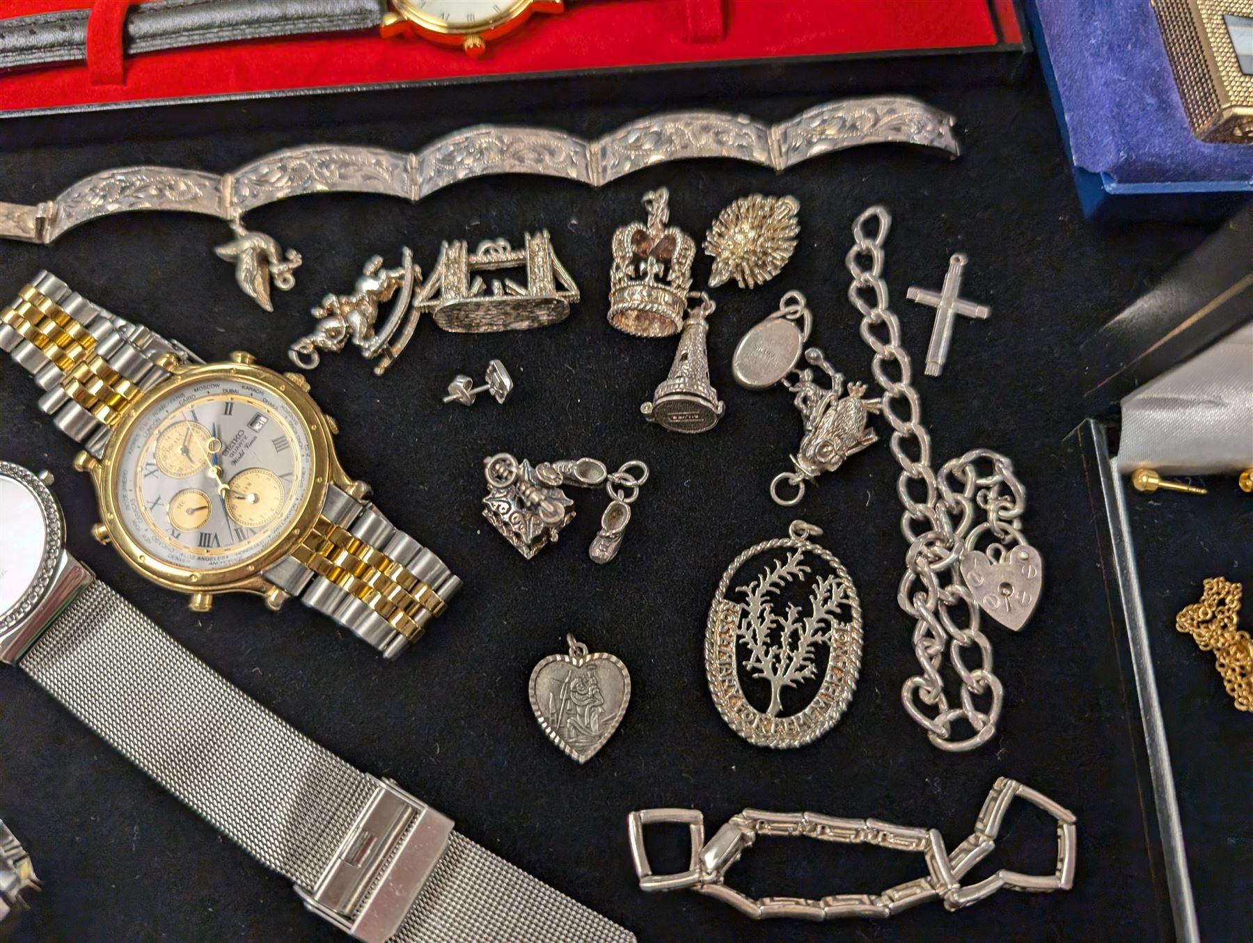 Silver jewellery, including charms, three bracelets and pendant, together with a Seiko wristwatch, Skagen wristwatch, costume jewellery and  a lighter