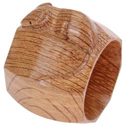 Mouseman - two oak napkin rings, bulbous octagonal form carved with mouse signature, by the workshop of Robert Thompson, Kilburn