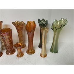 Collection of carnival glass trumpet vases and similar, largest H32cm