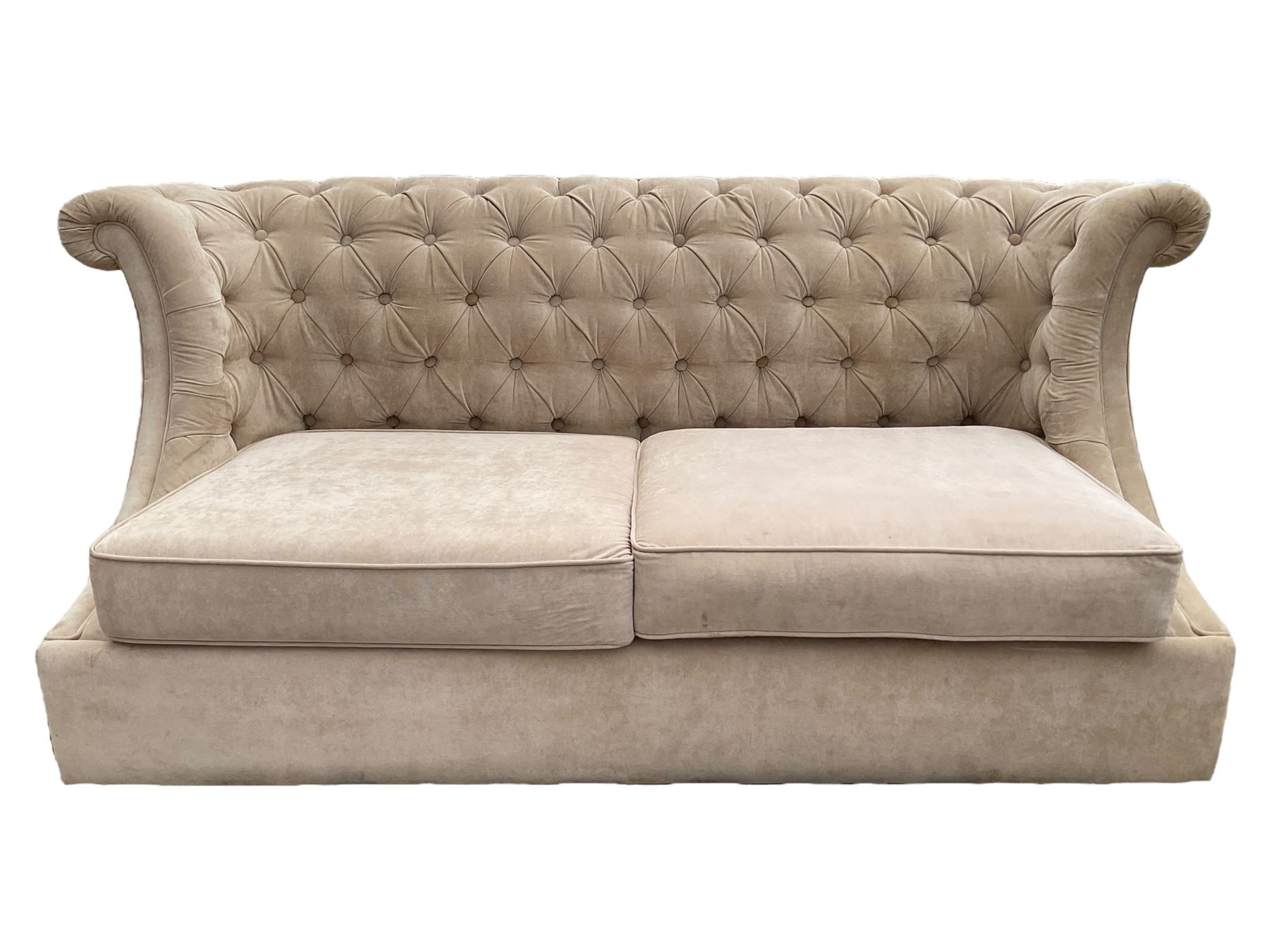 Grande wing back sofa bed, upholstered in beige buttoned fabric, metal action pull out double bed