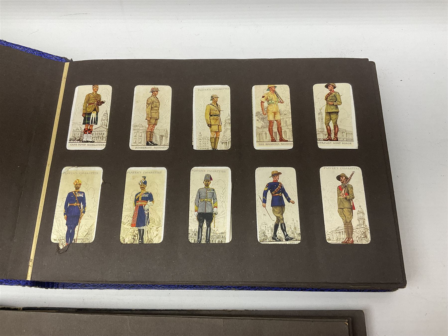 Four albums of cigarette cards, including Will's and Player's examples