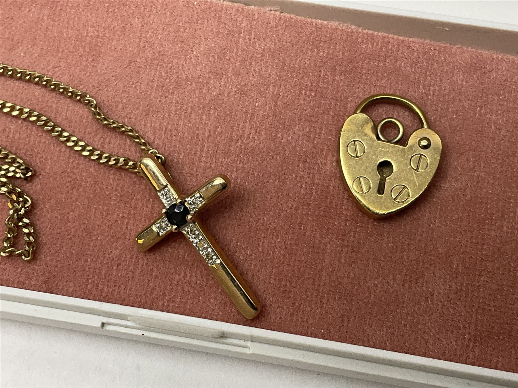 9ct gold diamond and sapphire cross pendant necklace, 9ct gold heart clasp and a silver charm bracelet 