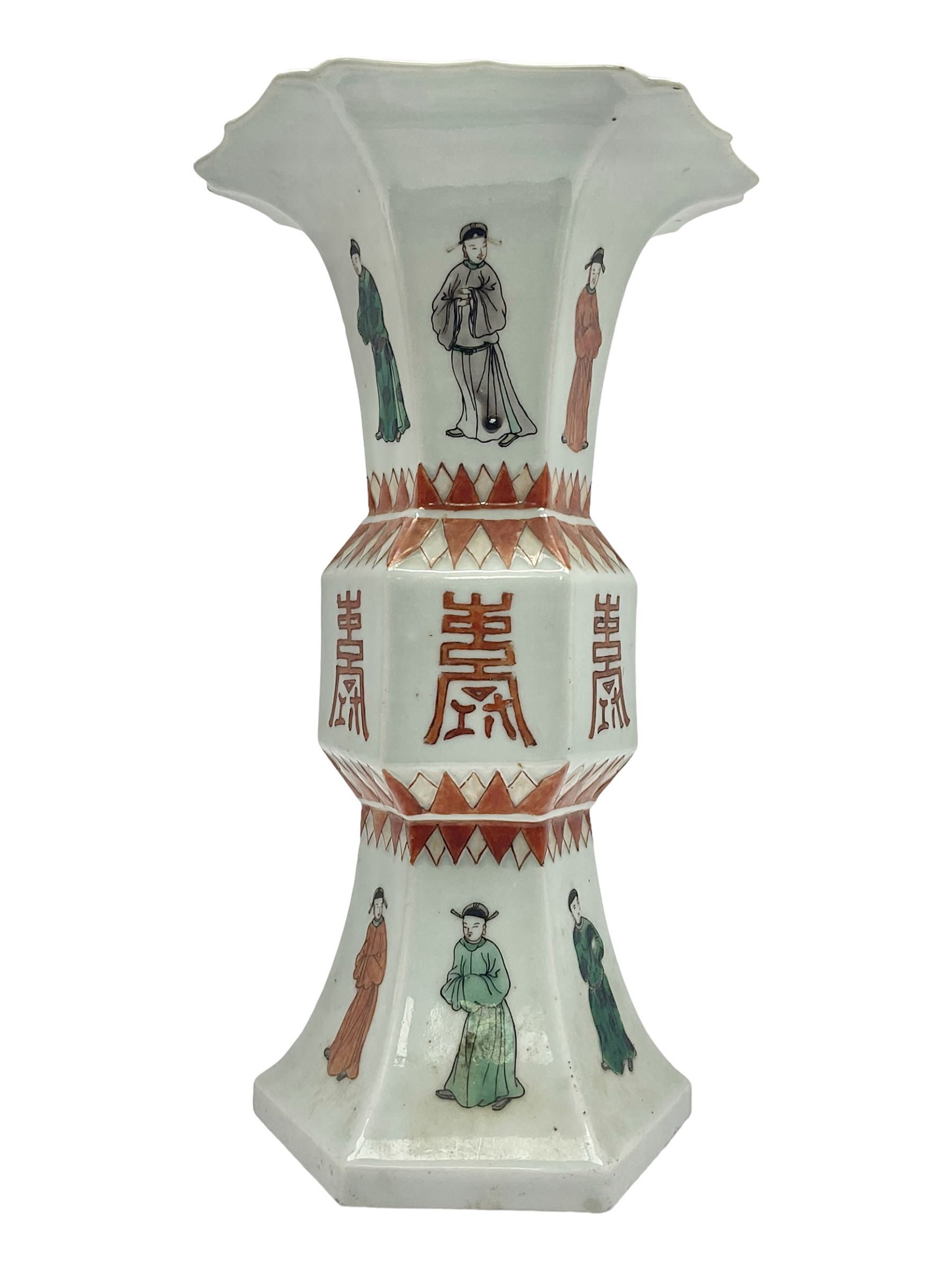 Chinese Kangxi gu vase, of hexagonal form with fluted rim, decorated in polychrome enamels with a male figure to each panel and red character marks to centre, with painted red leaf mark beneath, H32.5cm