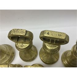 Set of seventeen Victorian brass bell weights