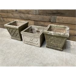 Pair of square cast stone planters, single planter with leaf decoration and a rectangular brick effect planter (4)