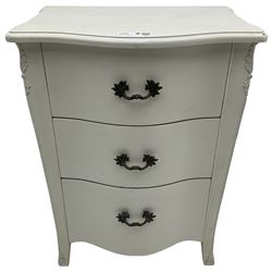 French design cream painted bedside chest, fitted with three drawers, with foliage decoration 