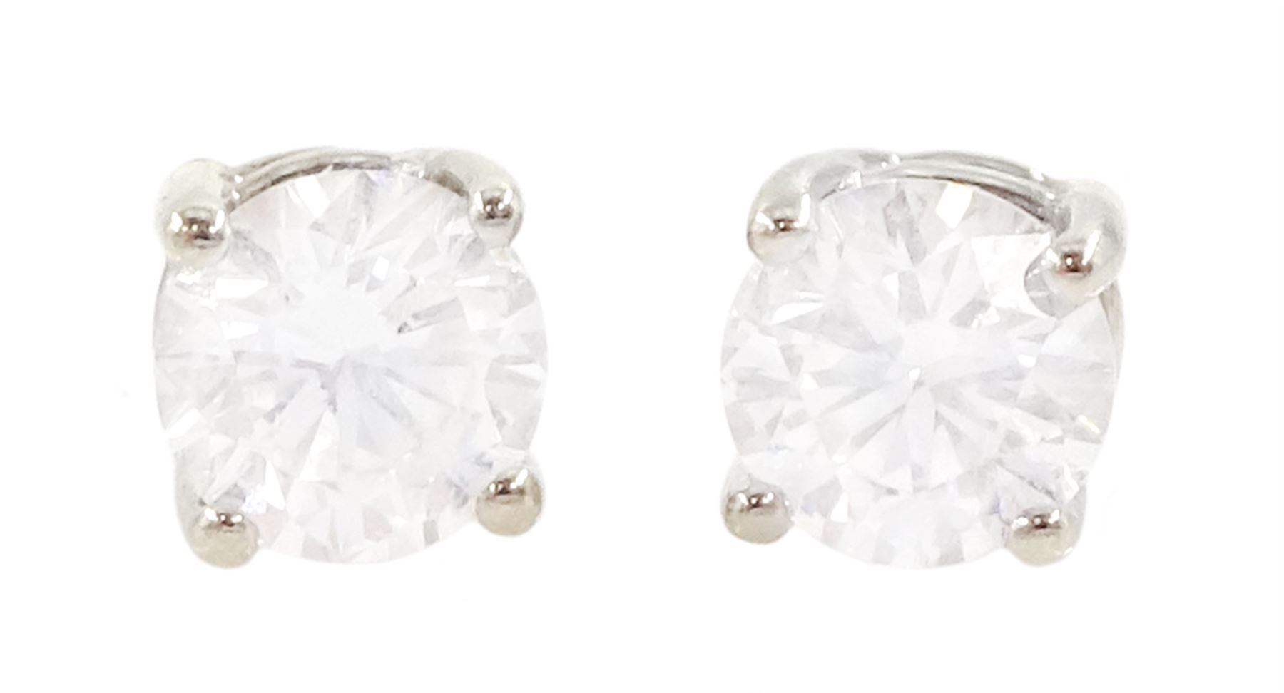 Pair of 14ct white gold round brilliant cut diamond screw back stud earrings, total diamond weight approx 0.30 carat