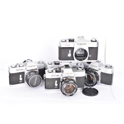 Five Canon SLR camera bodies all in silver and black finish, to include TX serial no. 144016, FX serial no. 210103, EX EE serial no. 136634 and two EX Autos, serial nos. 134020 & 157688, three with Canon 50mm 1:18 lenses