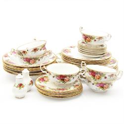 Royal Albert Old Country Roses pattern dinner service for six place settings, comprising dinner plates, side plates, dessert plates, soup bowls, bowls, small plates and salt and pepper shakers, all with printed marks beneath 
