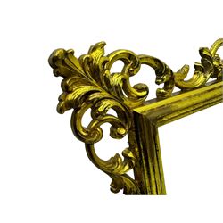 Large giltwood framed rectangular mirror, in Rococo revival design, scrolling foliate frame with gilt finish, plain glass plate