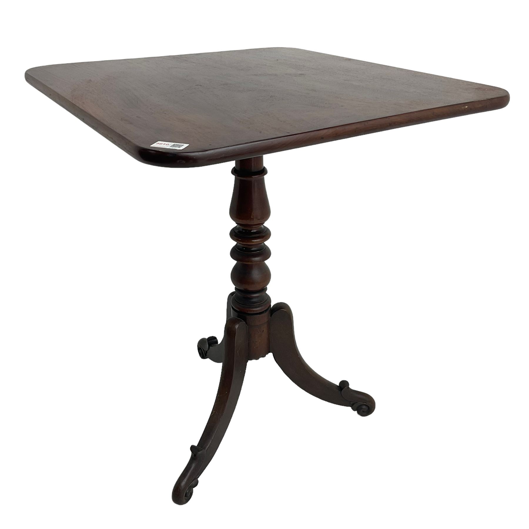 Victorian mahogany tripod table, rectangular tilt-top with rounded corners, on turned pedestal, three splayed supports with scroll carved terminals