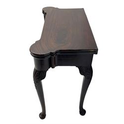 Late 18th century Irish mahogany tea table, rectangular form with projecting stepped rounded corners, fold-over action top over single frieze drawer within cock-beaded surround, on shell and bellflower carved cabriole supports, single gate-leg action base 