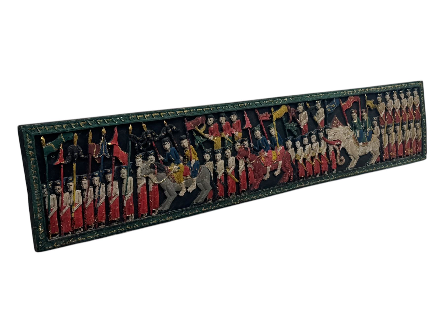 Rectangular relief carved and painted wall hanging panel, depicting ceremonial procession with soldiers and flag bearers on horses and elephants