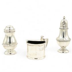 Silver circular mustard pot with hinged lid, London 1972, silver salt 1970 and a pepperette 1971, various makers 