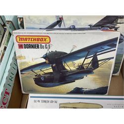 Twelve scale model kits, comprising ten model aircraft kits from Hasegawa, Nichimo, Fujimi and Matchbox, and two further Hasegawa 1:8 scale aircraft mounted machine gun kits, in two boxes 