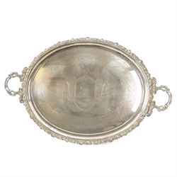 Large Victorian silver plated twin handled serving tray, of oval form with foliate and aca...