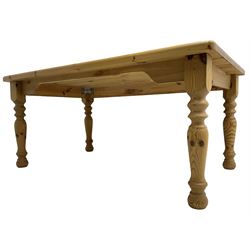 Pine dining table, rectangular top with rounded corners, on turned supports 