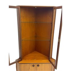 Nathan - teak corner display cabinet, double glazed doors enclosing two adjustable shelves over single cupboard.