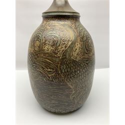 John Egerton (c1945-): studio pottery stoneware lamp base, decorated with cranes in a riverscape upon a mottled brown ground, H51cm