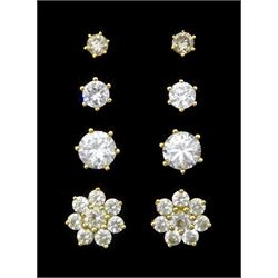 Pair of 18ct gold round brilliant cut diamond stud earrings and the pairs of 9ct gold cubic zirconia stud earrings