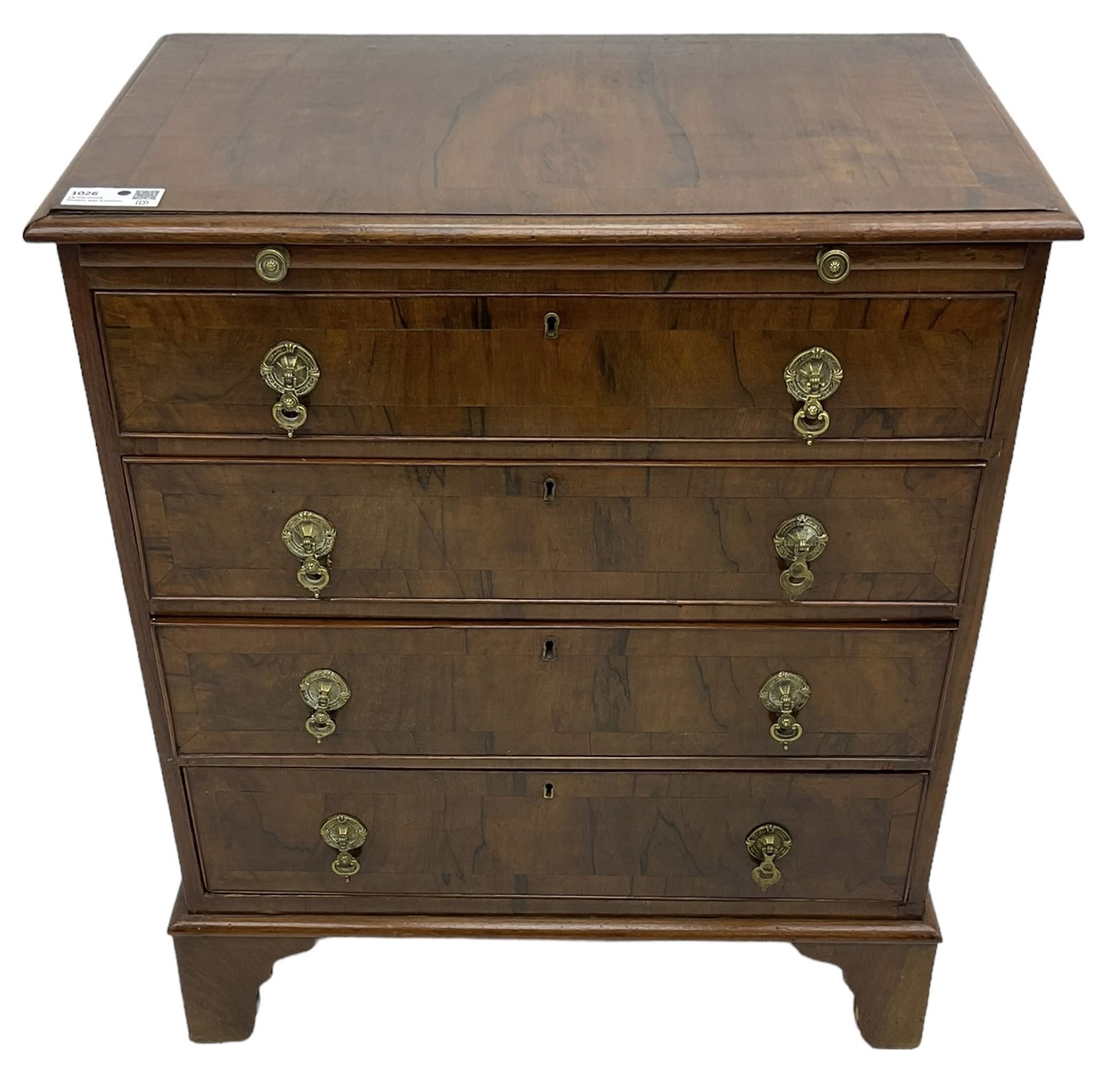 Georgian design walnut chest, crossbanded rectangular ovolo-moulded top, fitted with slide over four long cock-beaded drawers, on bracket feet