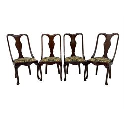 Set of eight late 19th century mahogany spoon back dining chairs, each with shaped top rail over Queen Anne design vase-shaped splat, upholstered seats in floral patterned fabric, raised on cabriole supports with scroll carved knees