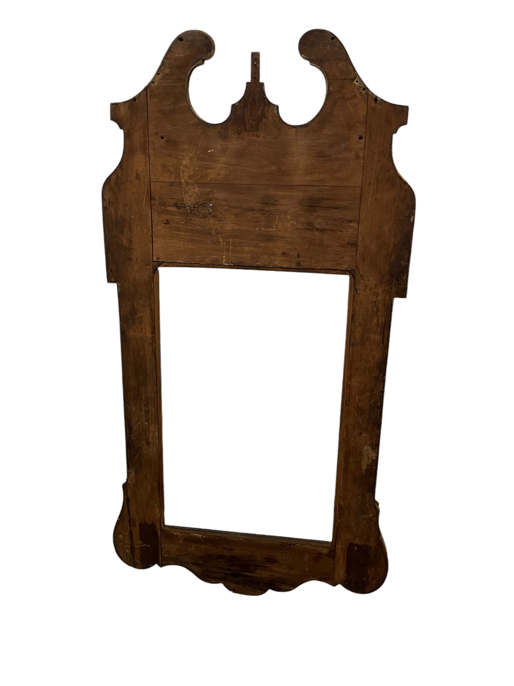 Late 19th century Italian mirror frame, broken swan neck pediment over shaped lower edge, applied mouldings, aperture - 43.5cm x 69cm 