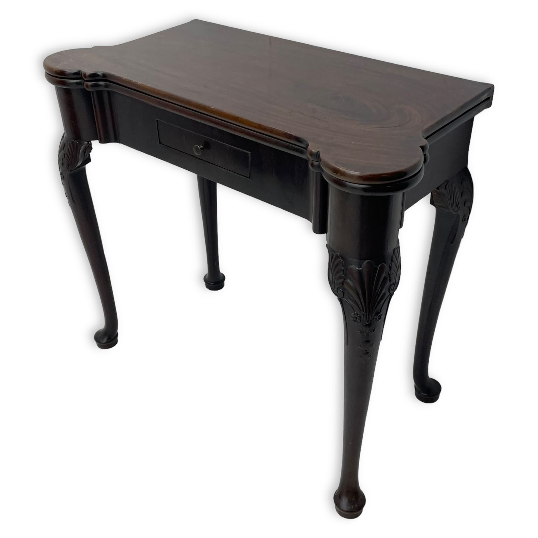 Late 18th century Irish mahogany tea table, rectangular form with projecting stepped rounded corners, fold-over action top over single frieze drawer within cock-beaded surround, on shell and bellflower carved cabriole supports, single gate-leg action base 