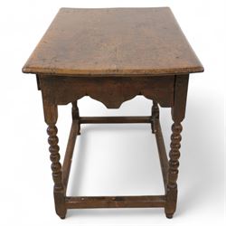 17th century oak side table, two plank rectangular top over single drawer, on bobbin-turned supports united by stretchers 