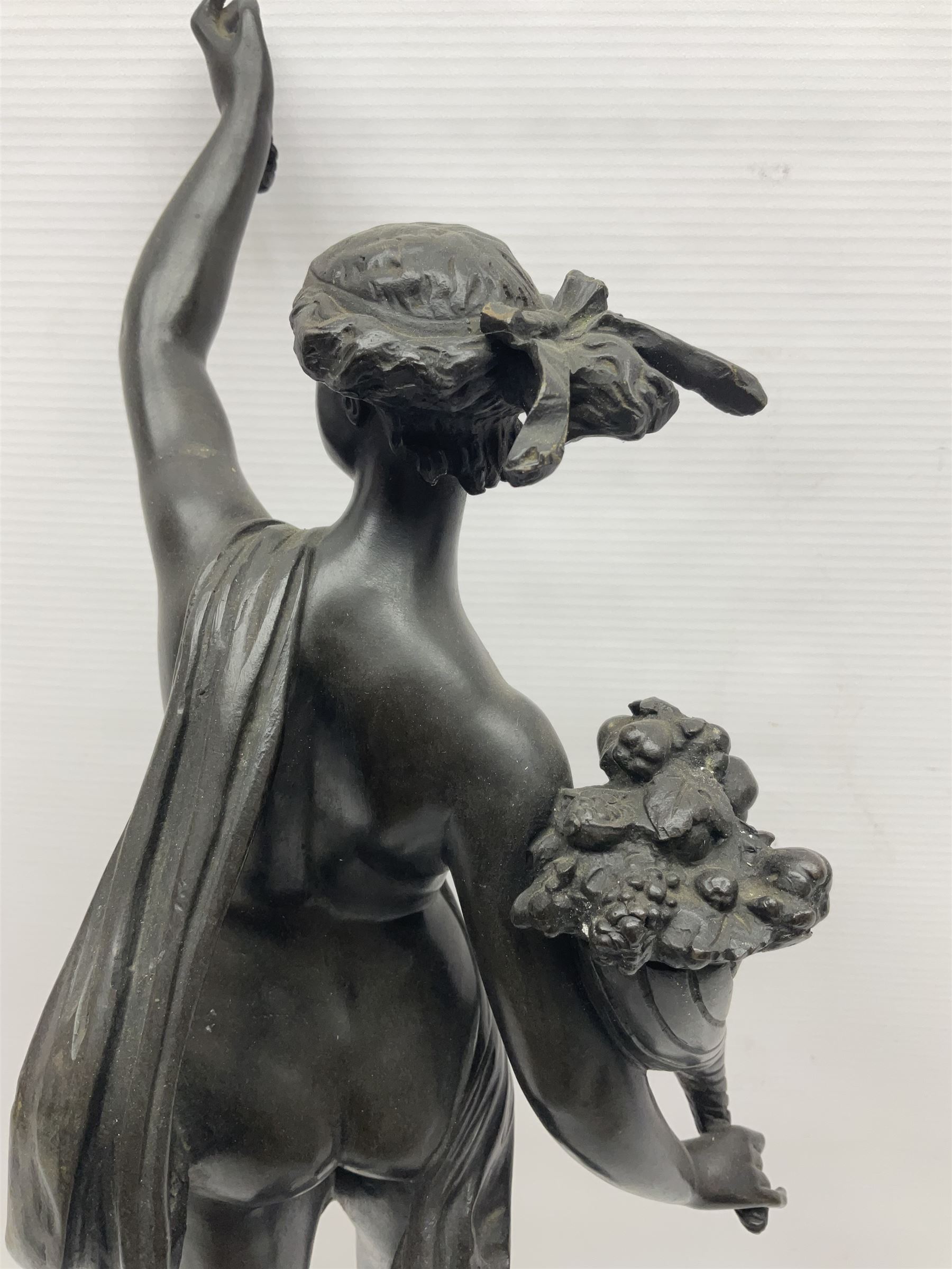 After Louis Guillaume Fulconis, a bronzed figure of Fortuna with cornucopia in her right hand and standing on a wheel on green serpentine base, height 60cm