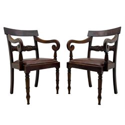 Set of six (4+2) early 19th century mahogany dining chairs, figured bar back over rose and curled leaf carved middle rail, drop-in seats upholstered in brown fabric, on turned front supports 