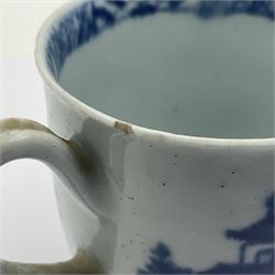 Two 18th century Worcester porcelain coffee cups, the first example decorated in the Plantation pattern, circa 1754, the second decorated in the Mansfield pattern, circa 1760, with workman's mark beneath, each approximately H5.5cm