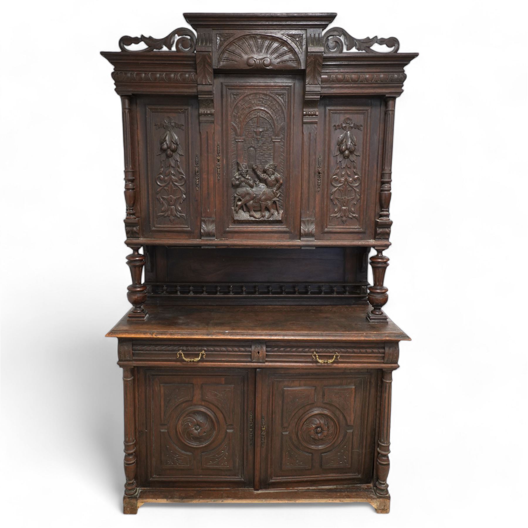 19th century Belgian buffet side cabinet, carved inn scene with figures, fitted with three cupboards, two drawers and two base cupboards