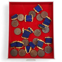 Eighteen Hull Education Committee 'Perfect Attendance At School' medallions, six cased and three Hull Times Long Service Medals 'For 25 Years Continuous Service', housed in a Lindner tray