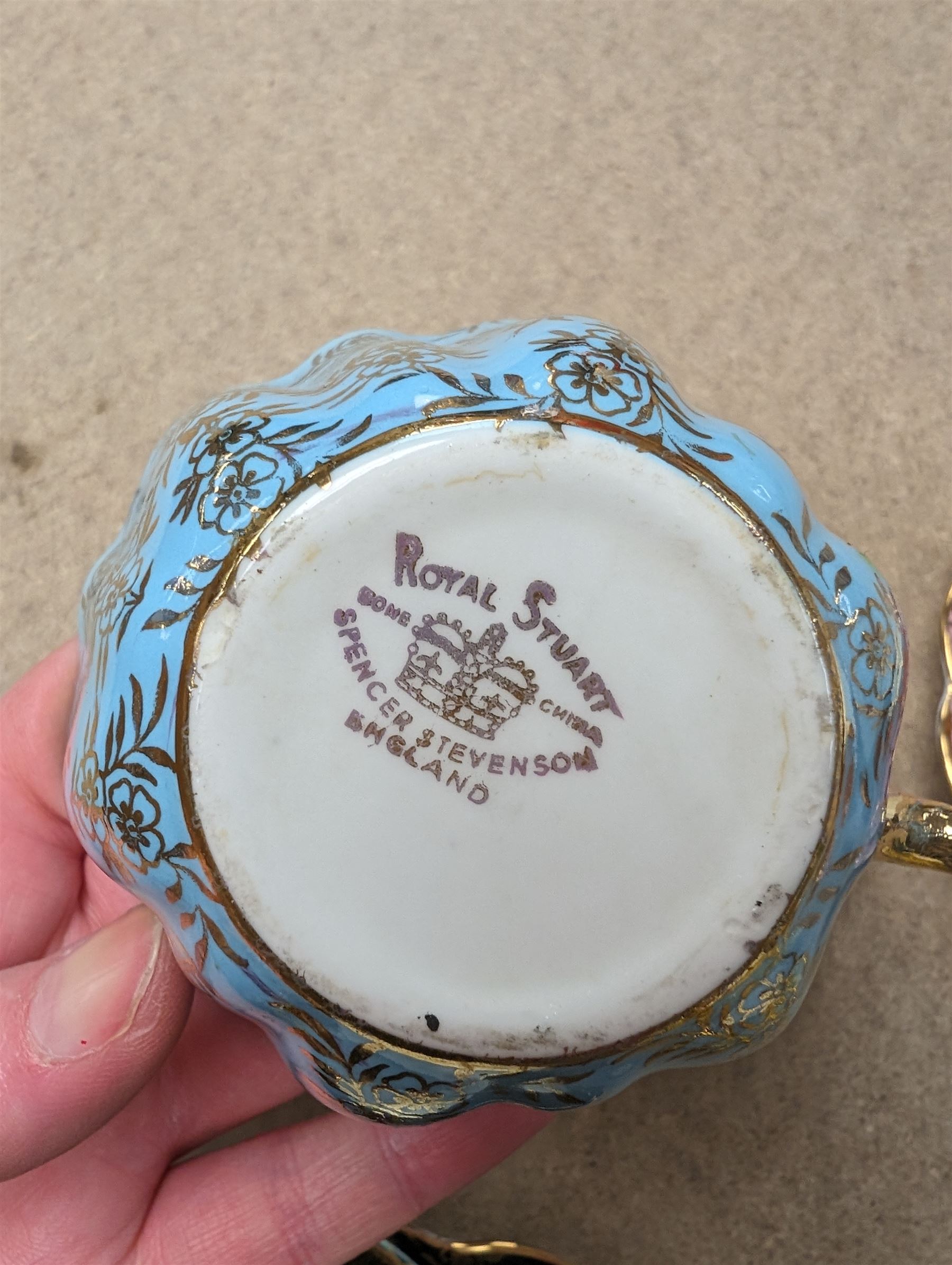 Set of six Royal Stuart Spencer Stevenson Harlequin cup and saucer trios, with gilt floral decoration 