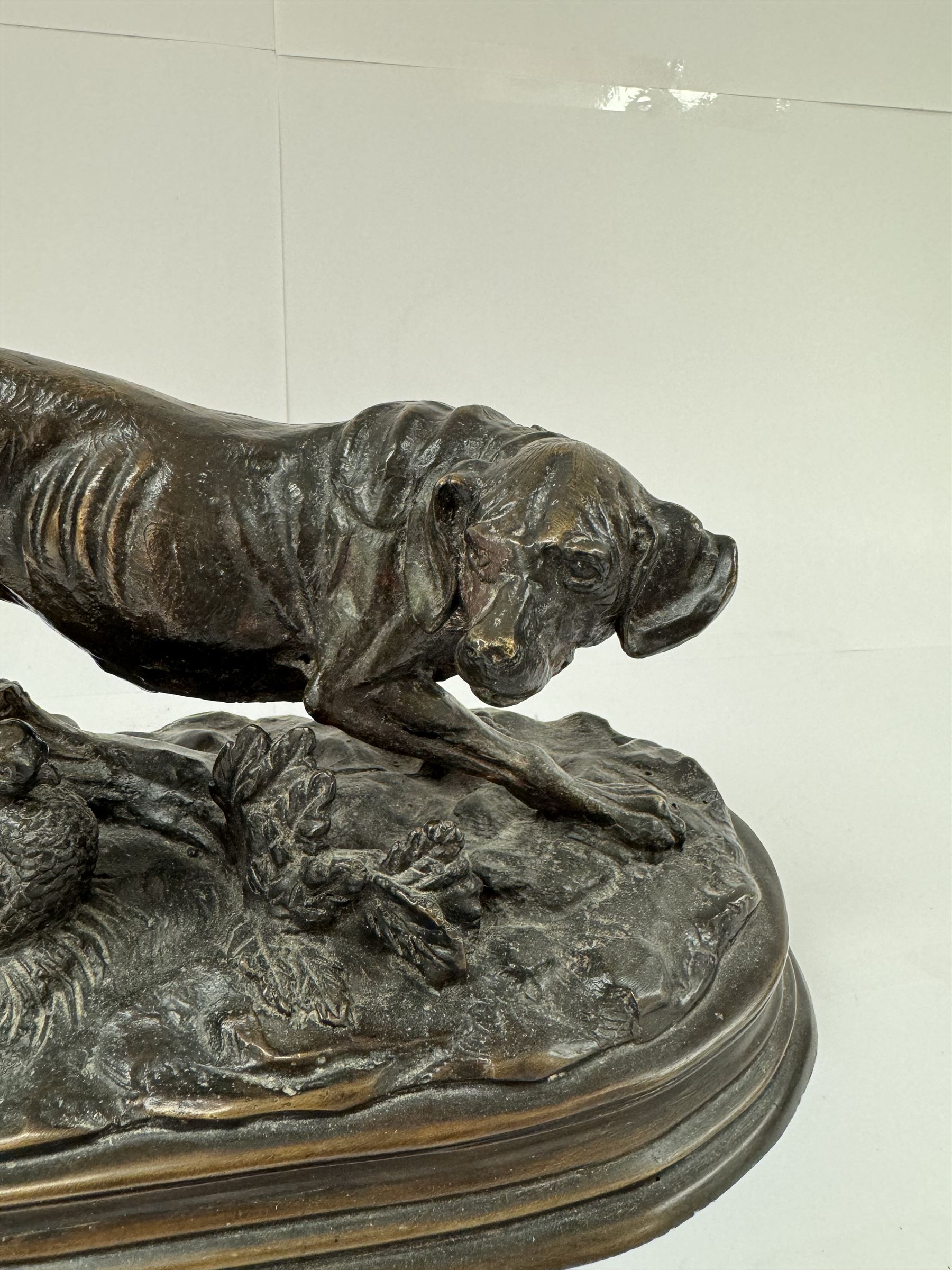 Bronzed figure after Paul-Edouard Delabrierre, modelled as a crouching Pointer with pheasant, inscribed E. Delabrierre to base, H16.5m