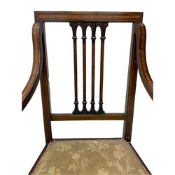 Edwardian satinwood inlaid mahogany elbow chair, the bar back over four vertical rails with foliate and scroll carved decoration, curved and down-swept arms, on square tapering supports united by stretchers 