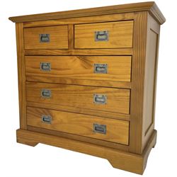Pine chest, fitted with two short and three long drawers