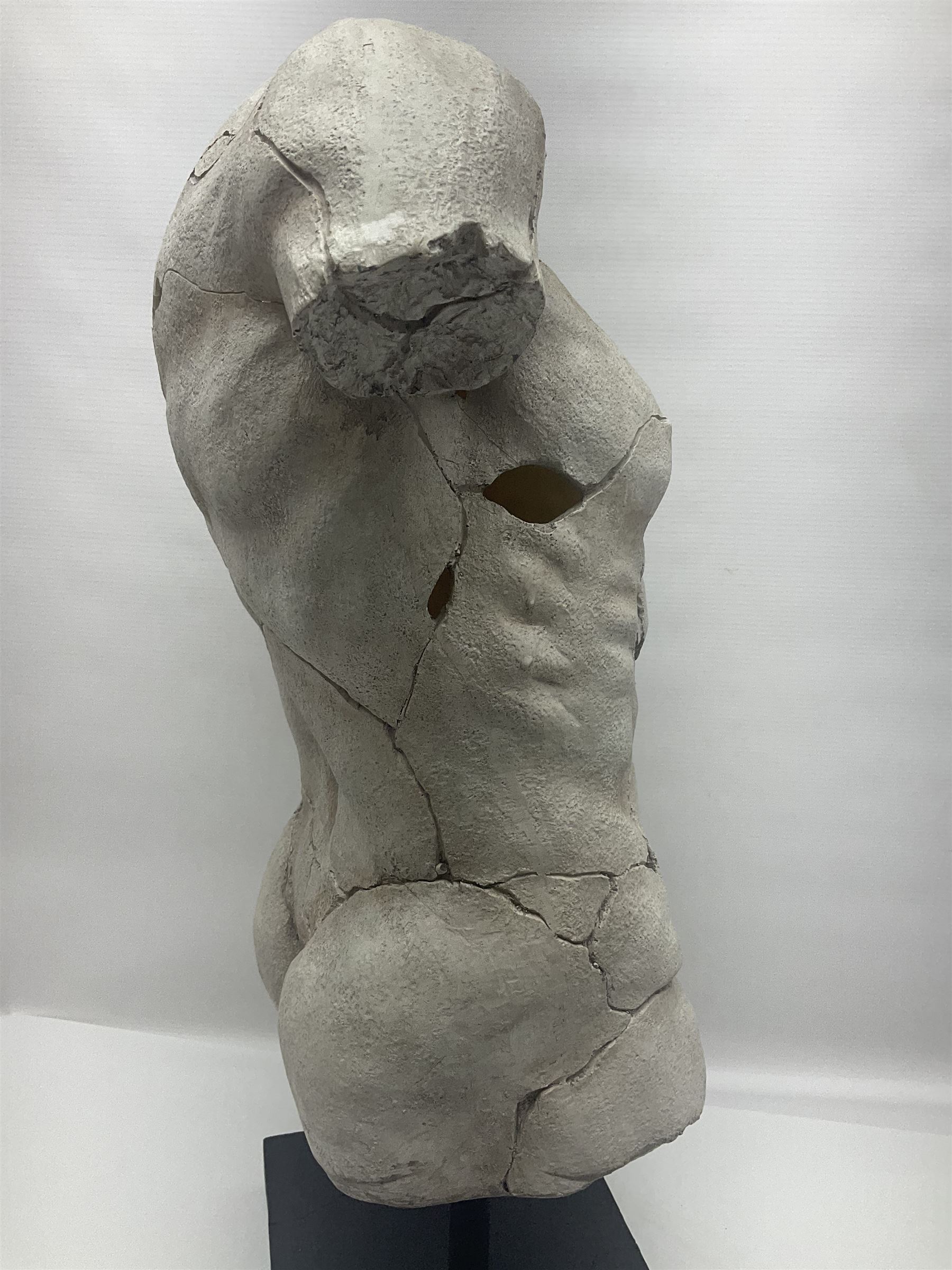 Composite sculpture of a Classical male torso on a stand, H65cm