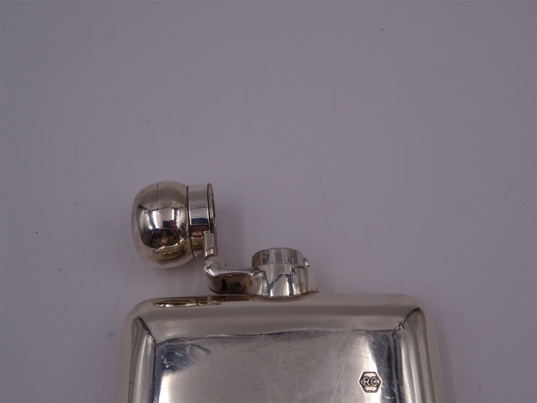 Modern silver hip flask, of typical form with hinged cap, the body with personal engraving, hallmarked Carr's of Sheffield Ltd, Sheffield 2005, H12.5cm