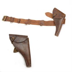 Sam Browne belt of brown leather with two Webley revolver holsters