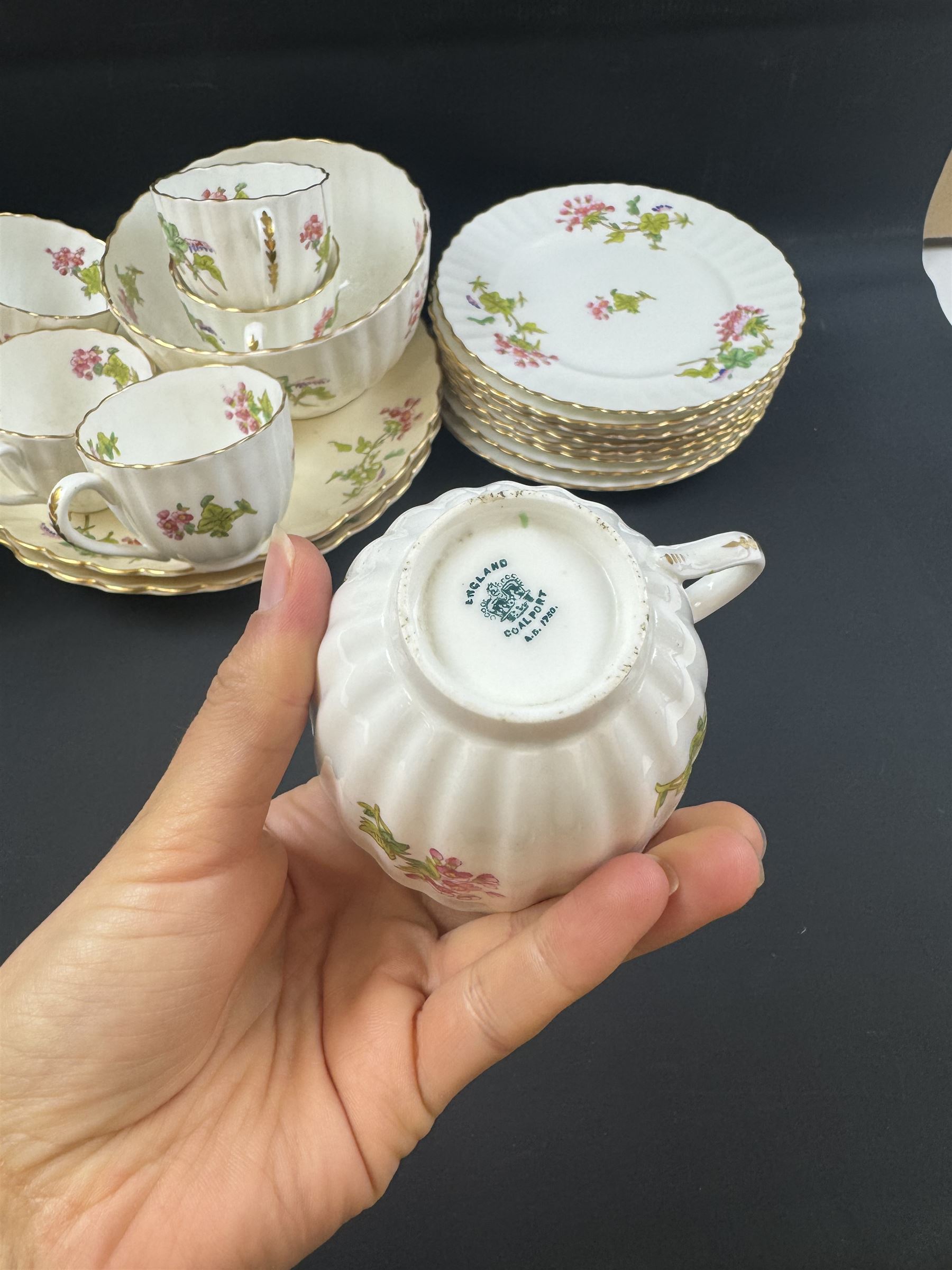 Coalport part tea service, decorated with floral sprigs, including eight cups and saucers, milk jug, eight dessert plates etc  