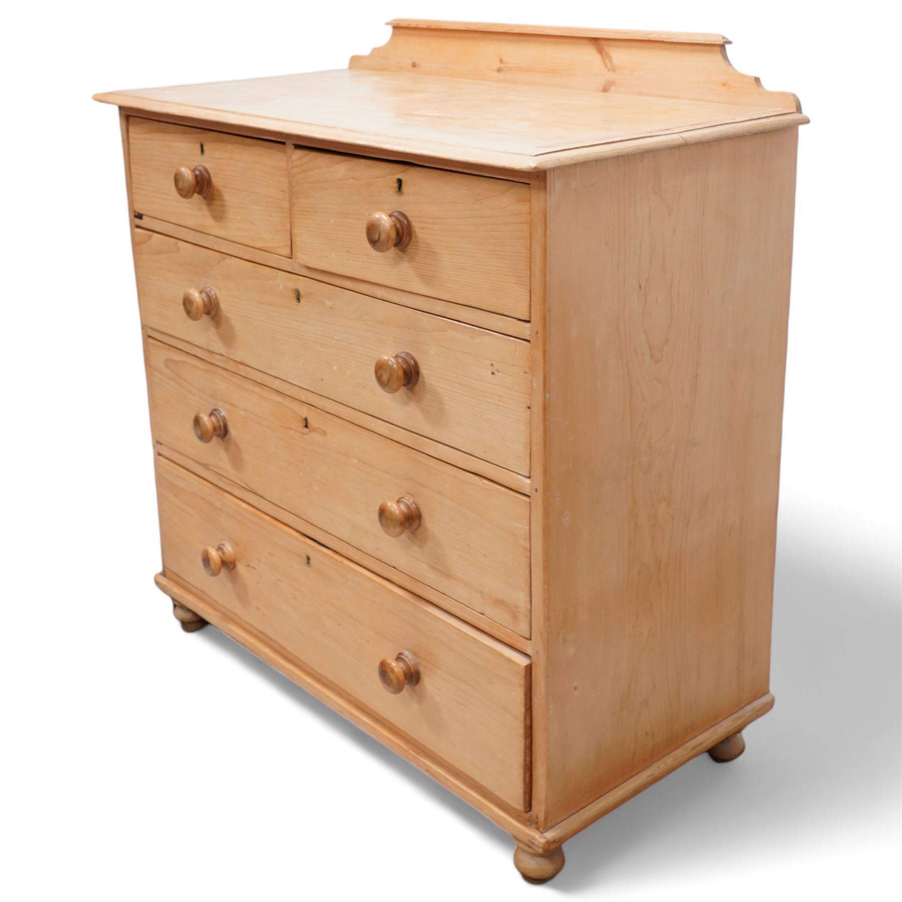 Victorian pine chest, raised back over rectangular top, fitted with two short over three drawers, on turned feet