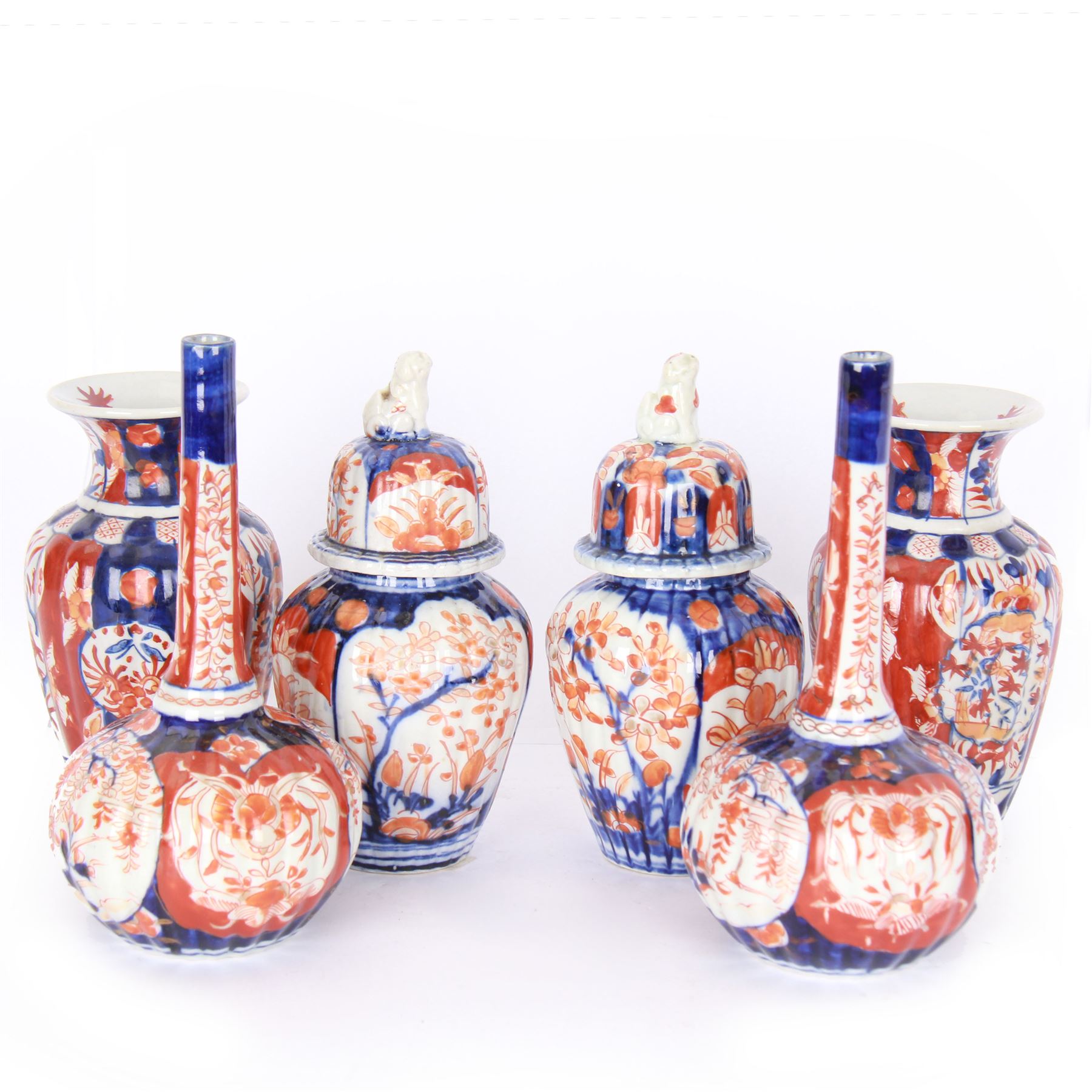 Three pairs of Imari vases, including a pair of baluster form with covers with foo dog finials, tallest H21cm 