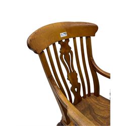 Late 19th century elm and ash comb-back Windsor chair, shaped back with pierced vase-shaped central splat and spindle supports, shaped saddle seat raised on turned supports united by H-stretcher